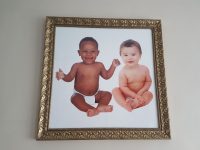 Babies in gold frame
